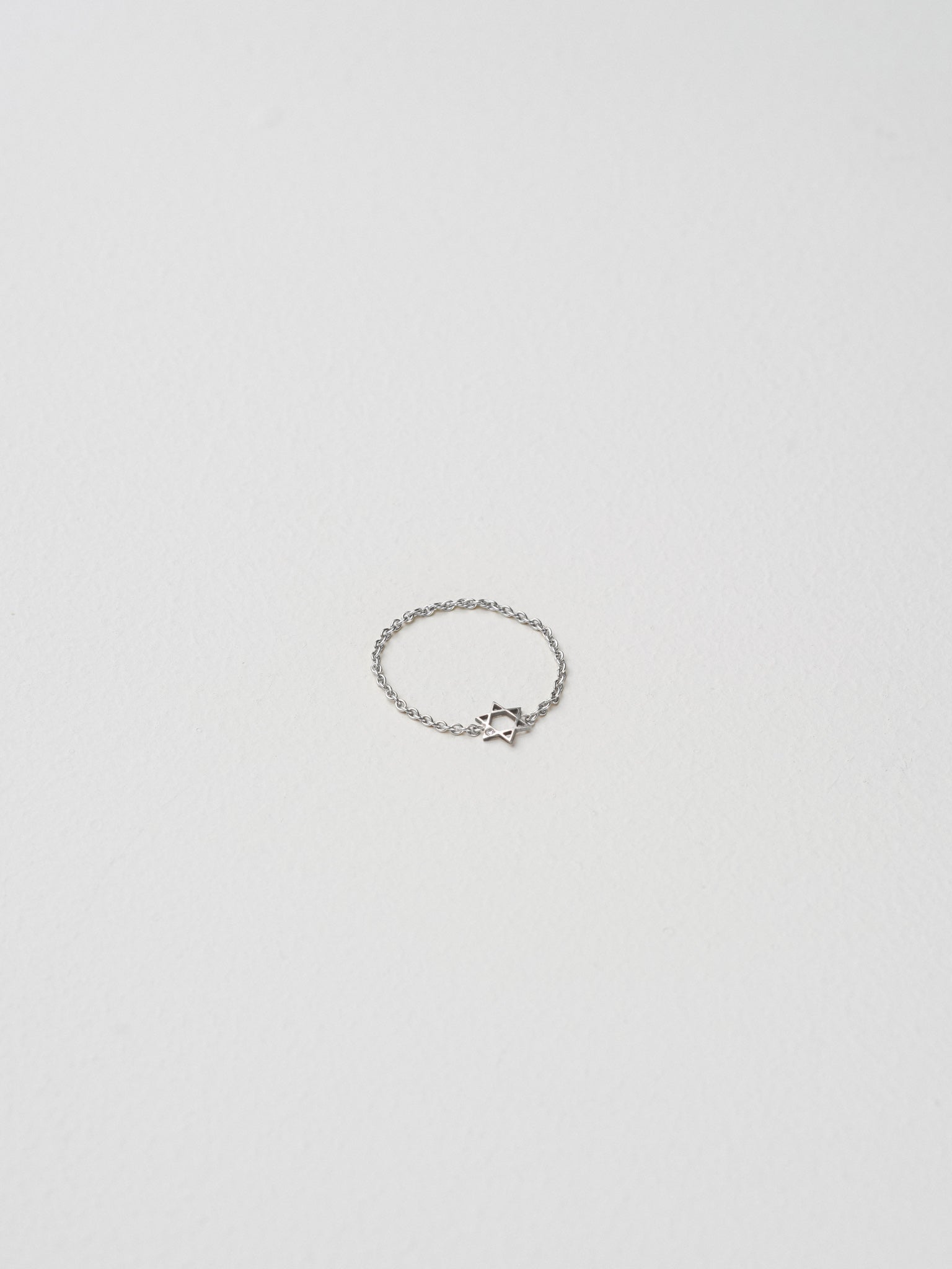 Rivkah Ring — detail view — delicate star of resilience silver ring — Oriya Jewels